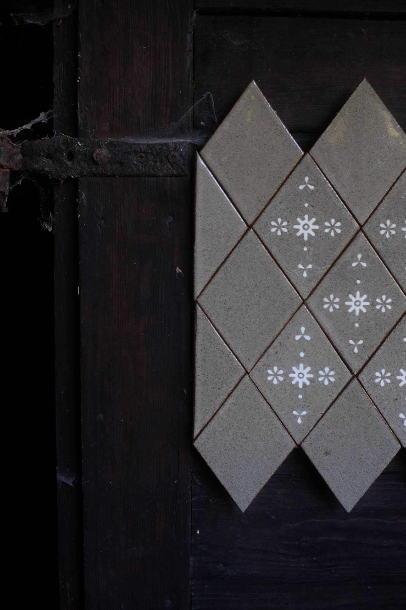 Detail of a hand-glazed tile pattern