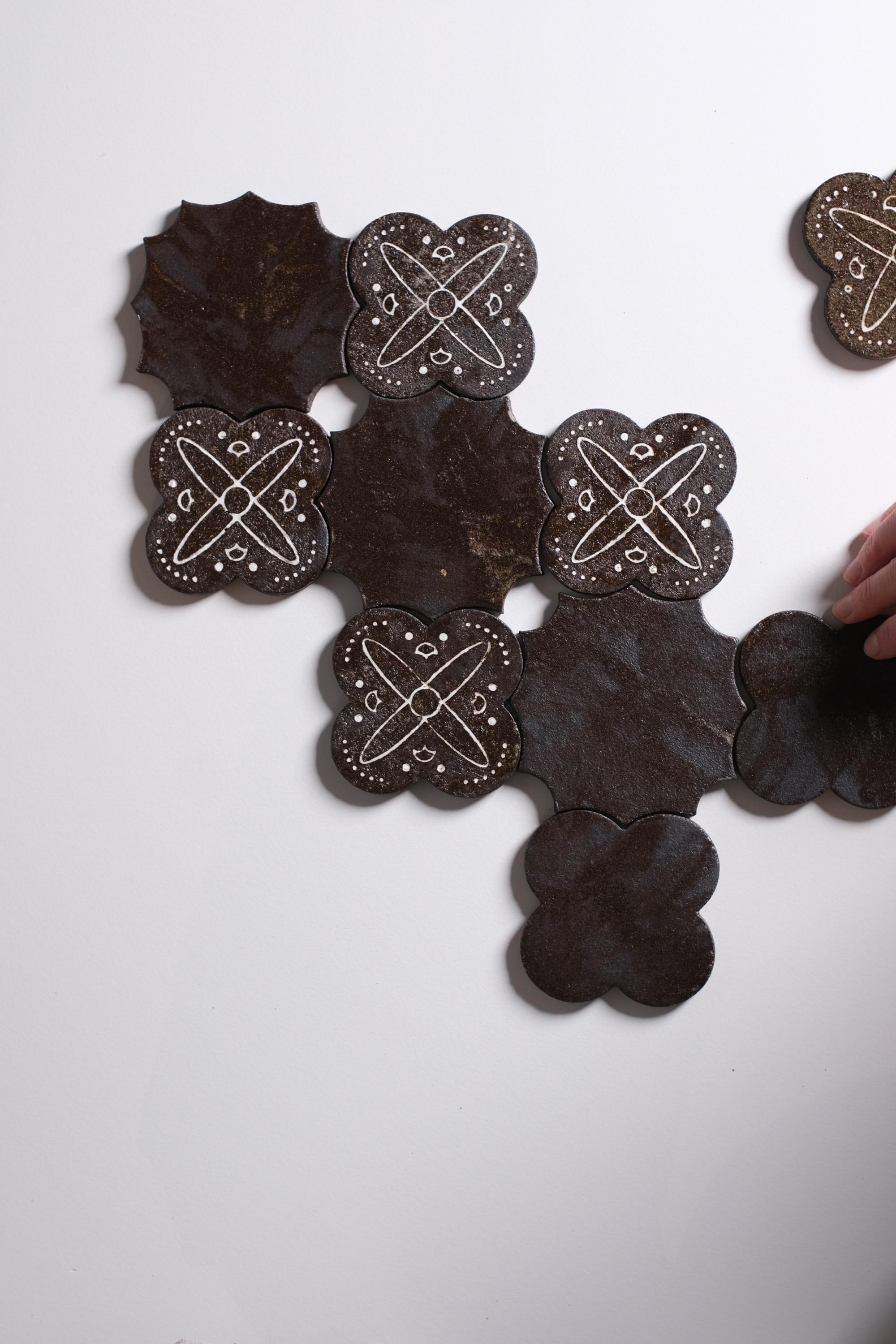 Quatrefoil - Isaac: Shapes inspired by the Gothic art period.