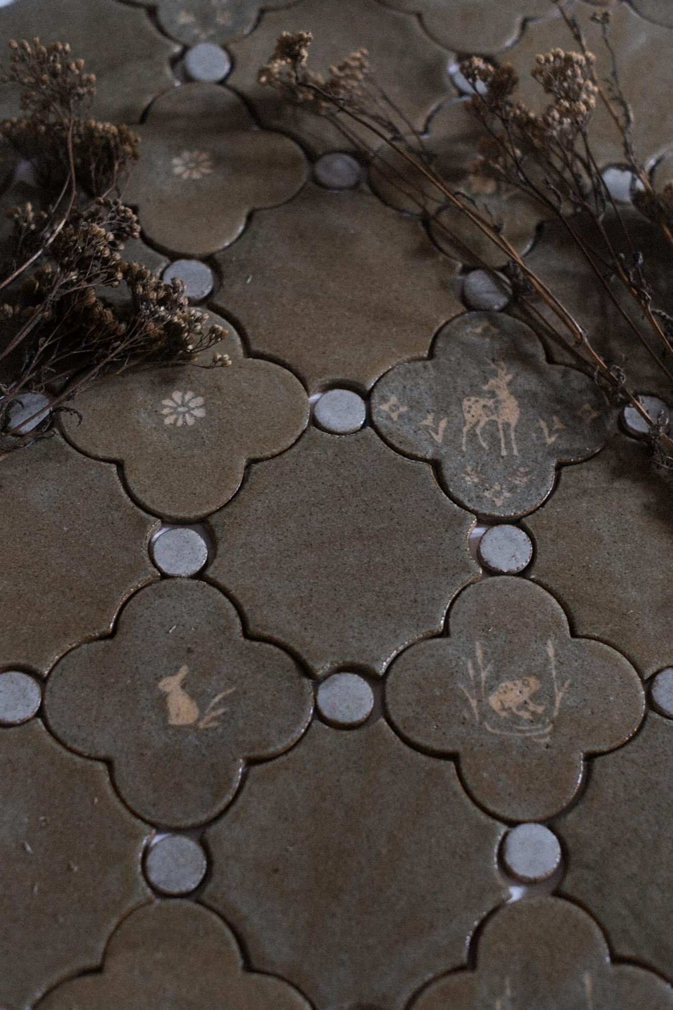 Quatrefoil - Isaac: Shapes inspired by the Gothic art period.